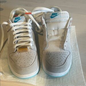 Nike Light Gray Suede Sneakers with Teal Accents